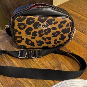 Coach Black and Brown Leopard Print Crossbody Bag small seam tear in the bag